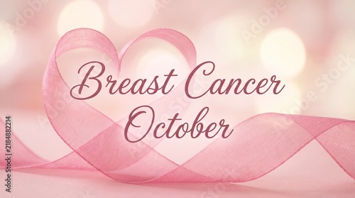 A delicate pink ribbon symbolizes breast cancer awareness during the annual october month campaign for support and research