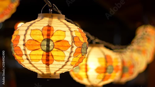 Beautifully Illuminated Traditional Asian Lanterns Glowing at Night.