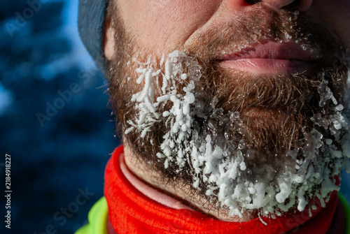 Obraz na plátně Frost covered beard close up after endurance running in freezing winter air
