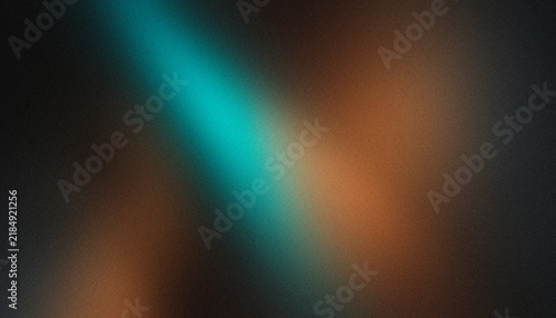 Abstract gradient background panoramic dark style with glowing turquoise diagonal light beam, rich burnt amber and fine film grain texture