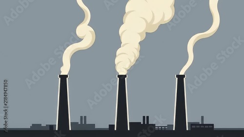 Tall Industrial Smokestacks Emitting Thick White Smoke Against Gray Sky