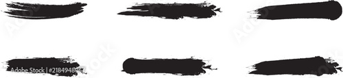 Black dried paint splattered in dirty style. Isolated black ink stencils for graphic design, Simple black brush strokes on a white background. Abstract Black Brush Stroke on White Canvas