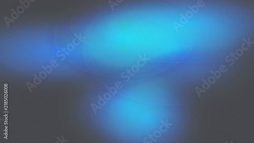 Abstract Blue and Cyan Glowing Light, Soft Blur, Luminous Haze on Dark Gray Background