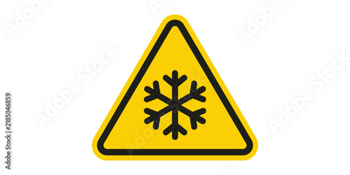 Yellow triangular caution sign with a snowflake symbol for cold temperature warnings.