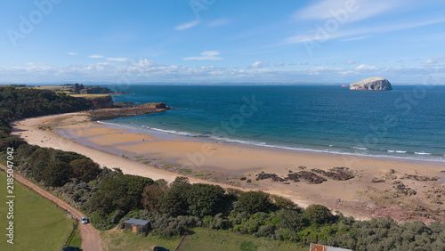 Canvas Print Panoramic view of Seacliff Beach sandy coastline with Bass Rock and Tantallon Ca