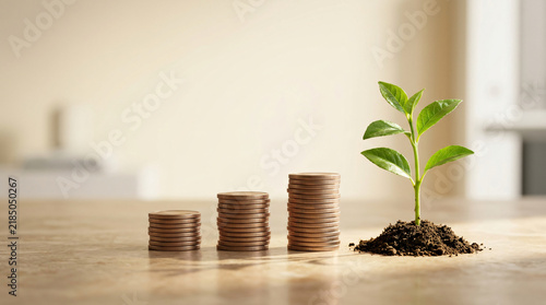 Passive income future-focused business concept with Healthy green sprout beside three gently rising stacks of coins for developing a sustainable wealth plan, on a refined minimal surface