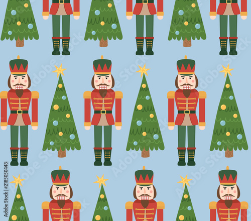 Seamless pattern of traditional nutcracker soldiers and decorated Christmas trees on light blue background.