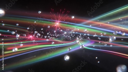 Abstract diamonds and rainbow light streaks moving with colorful fireworks exploding on a dark background