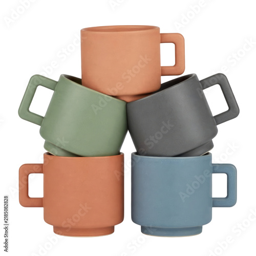 Stack of colorful ceramic coffee mugs isolated on a transparent background