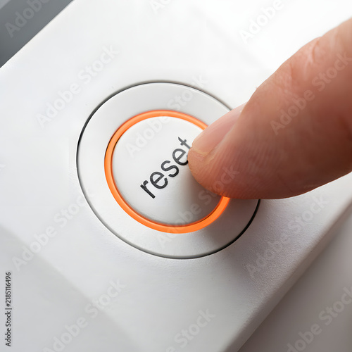 Obraz na płótnie Finger Pressing Reset Button