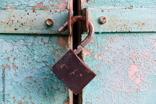 open padlock on the door