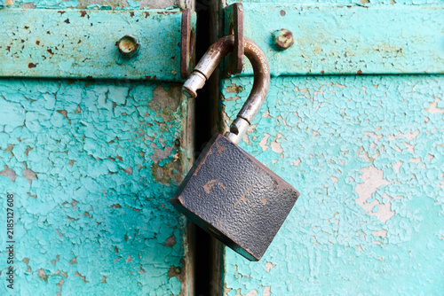 open padlock on the door