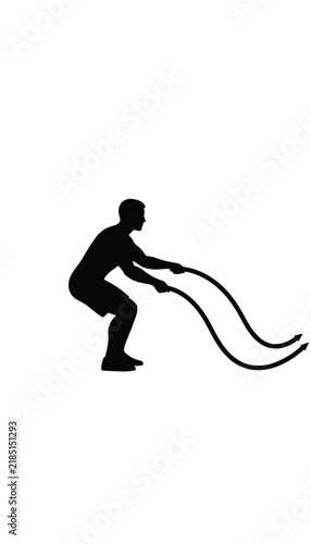 Dynamic silhouette of a man performing battle rope waves in a squatting position, showcasing functional strength and conditioning.