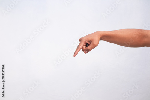 Human Hand Pointing Downward Isolated Against A Clean White Background