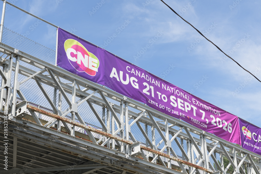 Fototapeta premium banner on exterior side of a footbridge over Lake Shore Blvd W for the CNE, or Canadian National Exhibition, 2026, Toronto