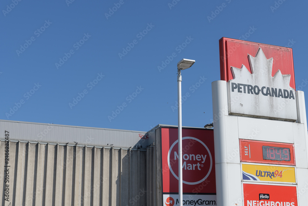Obraz premium roadside pylon sign at Petro-Canada, gas station, located at 1750 Bloor St W (and Keele St), Toronto