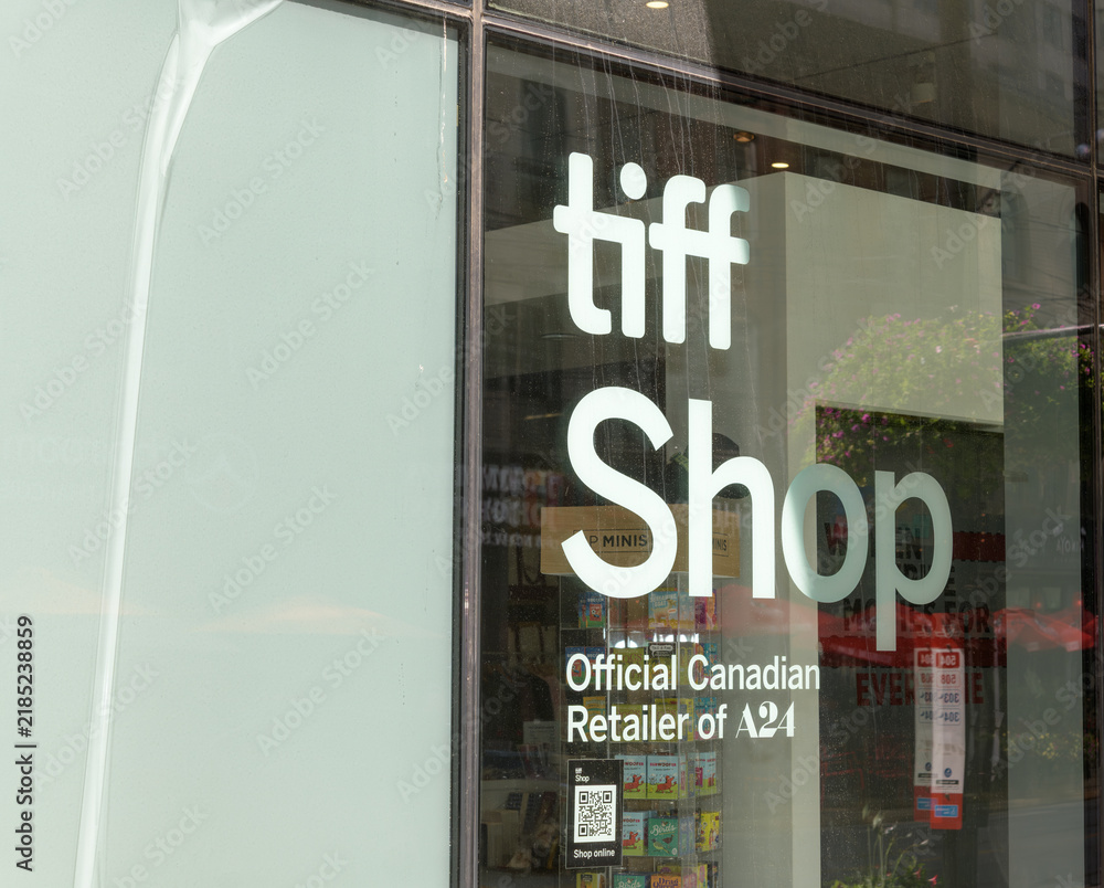 Fototapeta premium vinyl window sign of tiff the Shop at TIFF Lightbox, a movie theatre, located at 350 King St W, Floor 1 of the Festival Tower, Toronto