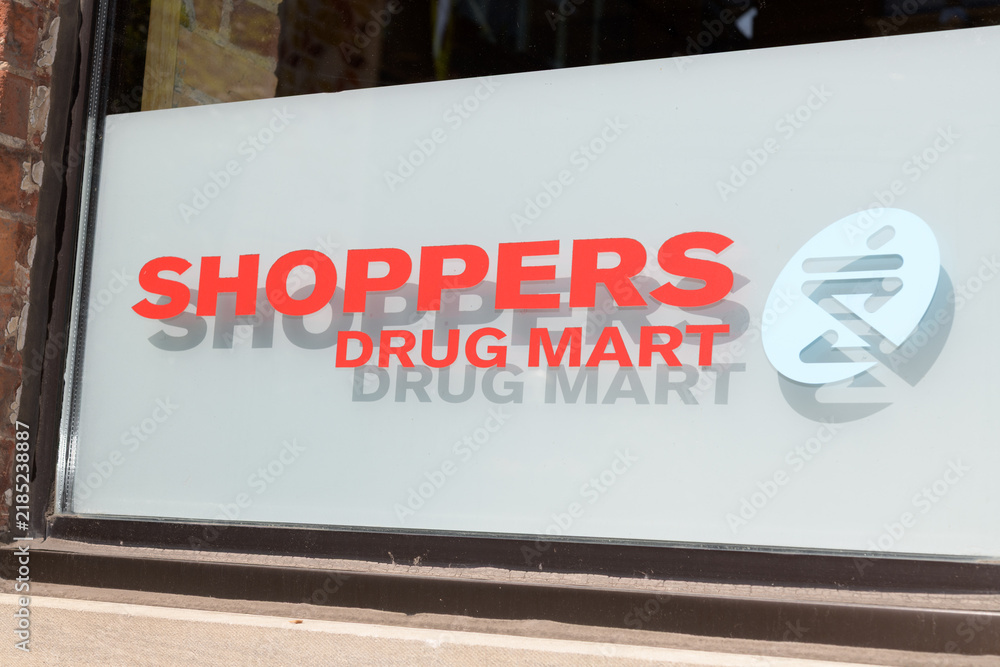 Obraz premium vinyl window sign at Shoppers Drug Mart, a pharmacy chain, located here at 500 King St W, Toronto