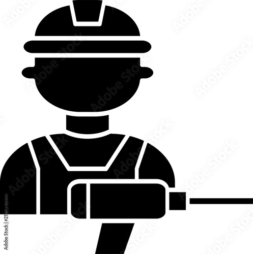 A worker wearing a safety helmet is holding a cordless electric drill