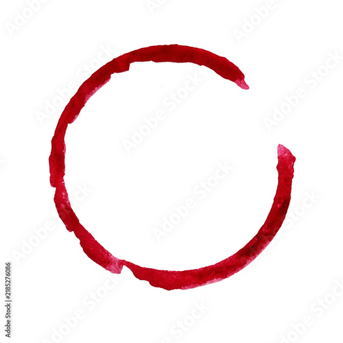 A single red wine glass stain circle mark left on a flat surface by a round bottom of a drinking glass cup