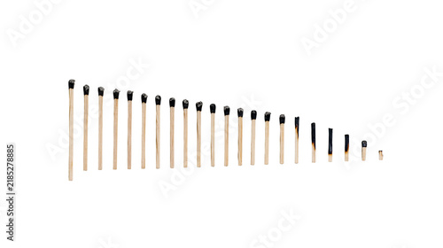 Konstfotografi Isolated row of natural wooden matches showing progression from unburnt to fully