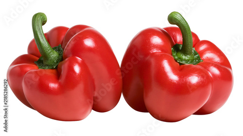 Fotografie Isolated pair of shiny red bell peppers showcasing freshness and vibrant color