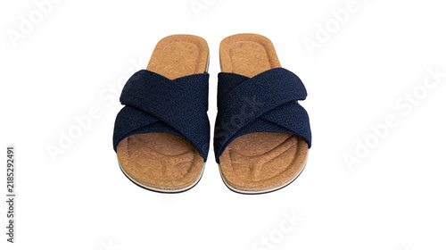 Isolated comfortable navy blue criss-cross strap cork sole sandals, perfect for summer fashion.