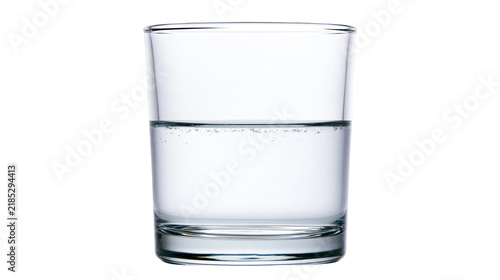 Cuadro en lienzo Isolated clear drinking glass filled with refreshing cool sparkling water, ready