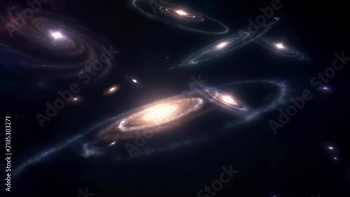 Slow motion tracking shot of spiral galaxies rotating and drifting across deep outer space cosmic expanse
