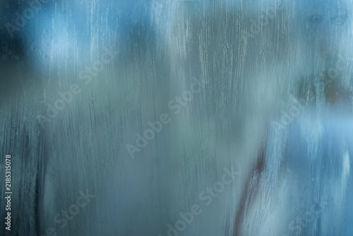 Quadro su tela Ghostly form behind scratched foggy glass, expression fear, memory, Mystery imag