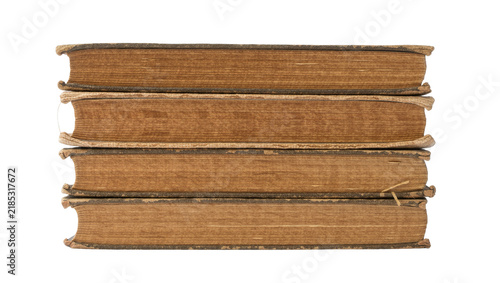 Cuadro en lienzo Stack of four antique brown hardcover books aged paper edges, isolated on transp