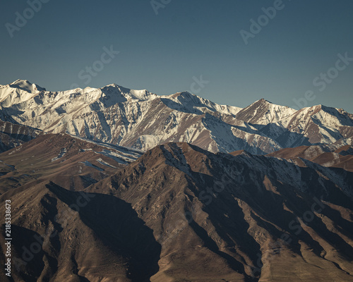 Photography Snow-covered Tian Shan mountain range near Bishkek, Kyrgyzstan