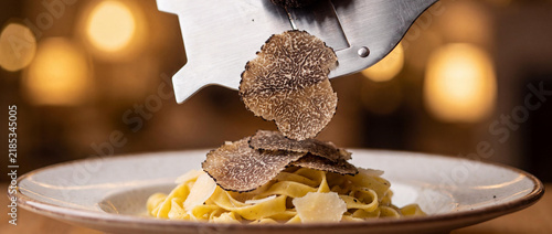 Fresh Black Truffle Shaved over Italian Pasta with Parmesan, Macro Food Photography, Gourmet Restaurant Culinary Experience, Warm Bokeh Background
