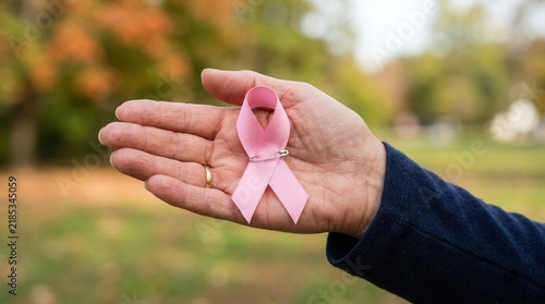 Symbol of Hope Held Gently in a Hand Outdoors