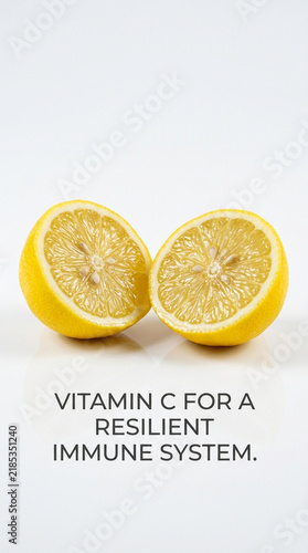 Fresh Lemon Halves on White Background with Vitamin C Text for Immune System Support