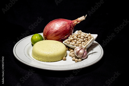 Garbanzo cheese on black background