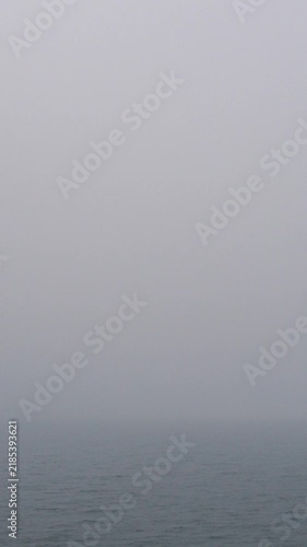 Foggy Sea Horizon on Calm Misty Morning