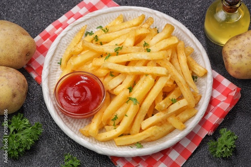 Crispy golden French fries served hot, with a crunchy exterior and soft, fluffy interior. A popular potato snack and side dish commonly served with burgers, sandwiches, or dipping sauce.