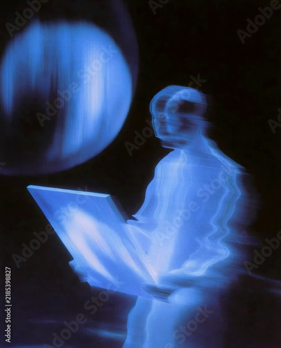 Futuristic Blue Holographic Person Using Laptop