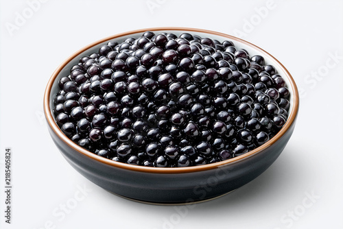 Fresh black currants in a bowl ready for cooking or eating