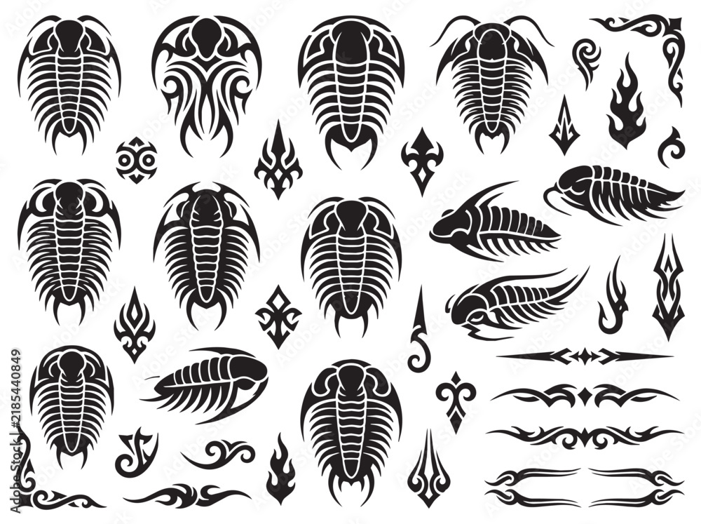 Fototapeta premium Tribal trilobite fossil tattoo design set featuring segmented exoskeleton silhouettes and ornamental abstract shapes in black and white vector style.