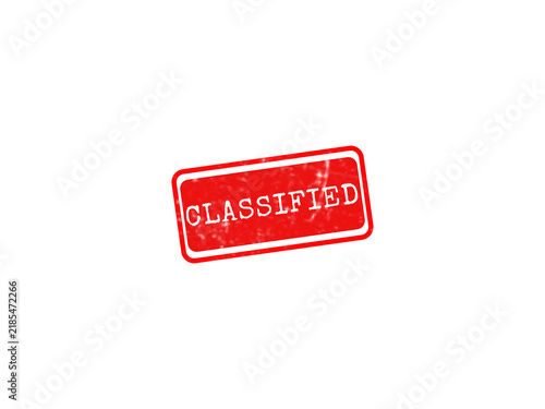 A red rectangular rubber stamp with a distressed texture and the word Classified in white, isolated on a white background for document marking