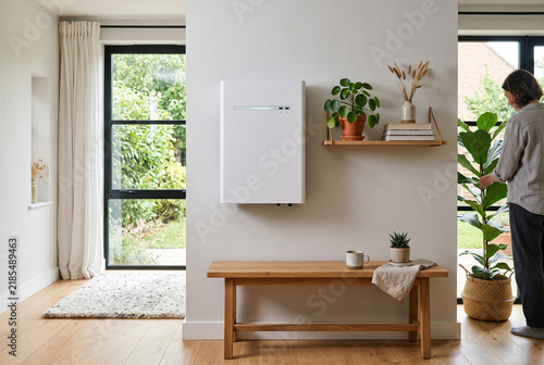 Wall Mounted Smart Residential Battery Storage Device in Sunlit Scandinavian Home