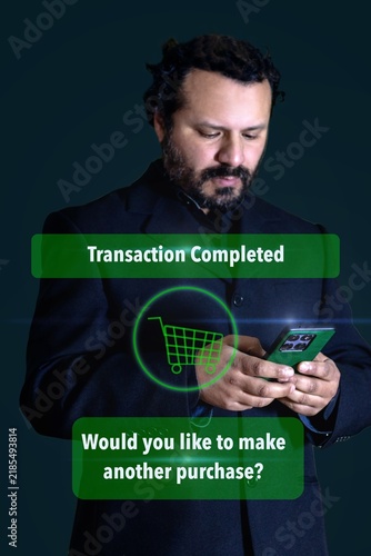A businessman dressed in business attire is shopping online on his phone