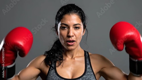 Strong Female Boxer with Red Boxing Gloves