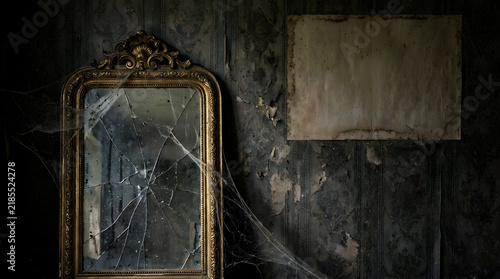 Haunting antique gold mirror with shattered glass and ornate frame, an eerie vintage reflection in a dark, abandoned room, spooky Halloween decor or horror film backdrop.