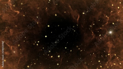 Golden fire flames with floating star sparkles on black background