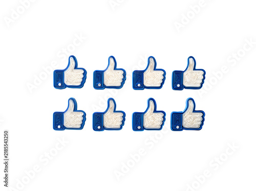 3D Printed Thumbs Up Icons on Black Background