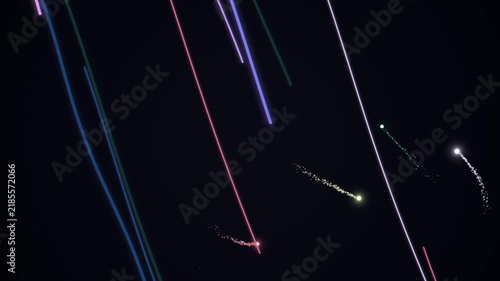 Abstract digital glowing light streaks falling meteor shower and comet trails on dark background