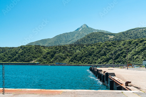 View of Mount Rishiri and Oshidomari Port under Clear Summer Sky